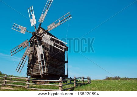 Landscape with old windmill in the village Pirogovo, Ukraine. Eastern Europe.