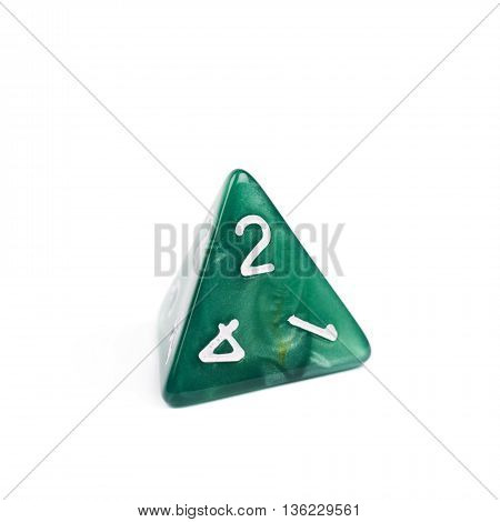 Green roleplaying polyhedral tetrahedron gaming plastic dice isolated over the white background
