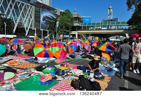 Bangkok Thailand - January 13 2014: Thanon Ratchaprasong is a sea of colourful shading umbrellas in front of Central World shopping complex on Day 1 of Operation Shut Down Bangkok *