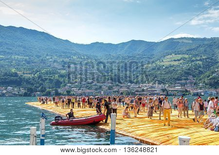 The Folating Piers people and panorama of the lake