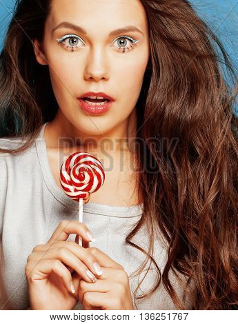 young pretty adorable woman with candy close up like doll makeup