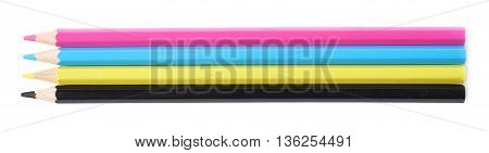 Four cmyk colored drawing pencils composition isolated over the white background