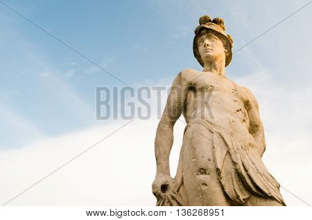 Ornamental white stone statue along the main avenue of Querini park in Vicenza