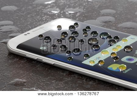 Koszalin, Poland  June 29, 2016: Photo of Samsung Galaxy S7 Edge white pearl. Samsung 7 Edge are new generation smartphone from Samsung. The Samsung S7 Edge is smart phone with multi touch screen