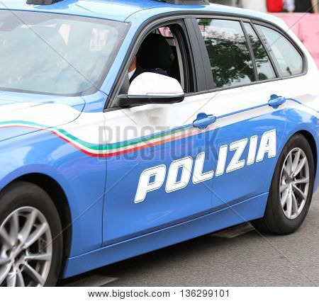 Italian Police Car With Written Polizia Patrols The Streets