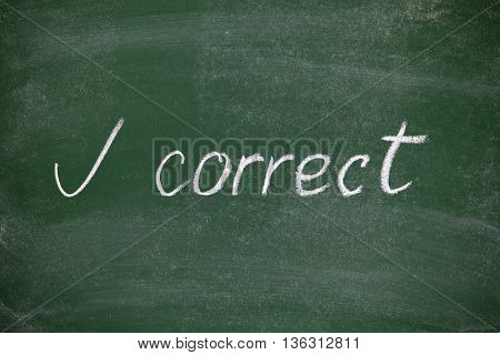 A Correct Answer Sign And The Word Correct Written On The Green Blackboard With White Chalk. Correct