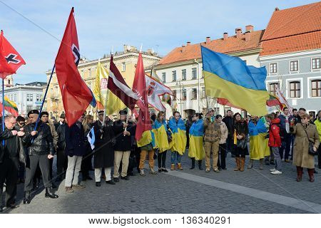 VILNIUS, LITHUANIA - MAR 11: Around one thousand people gathered with flags in a nationalist rally at Rotuses Square on Re-Establishment of Independence Day on March 11, 2014 in Vilnius, Lithuania