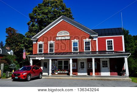 Grafton Vermont - September 19 2014: A long portico covers the entrances to the 1816 brick Town Hall and United States Post Office *