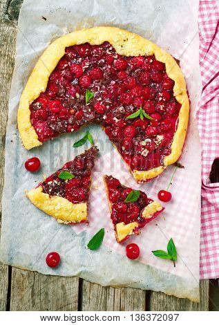 gallet with cherry and chocolate. top view. style rustic. selective focus