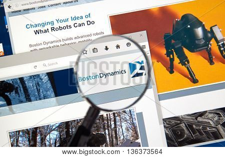 MONTREAL CANADA - JUNE 24 2016 : Boston Dynamics web page under magnifying glass. Boston Dynamics is the leading provider of human simulation software tools and solutions.