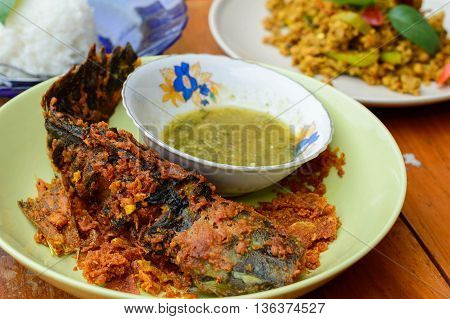 Deep fried catfish with turmeric  and Seafood sauce
