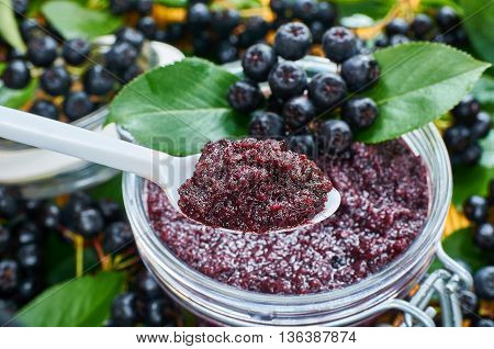 Chokeberry jam and ripe berry of chokeberry