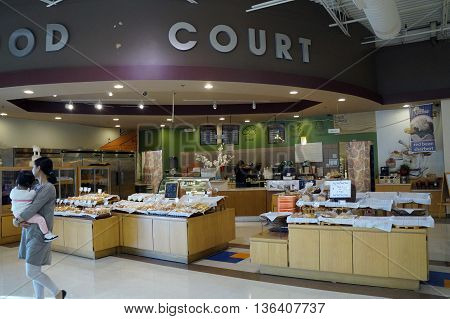 NAPERVILLE, ILLINOIS / UNITED STATES - NOVEMBER 3, 2015: One may purchase fresh baked items at the H Plaza food court in Naperville.