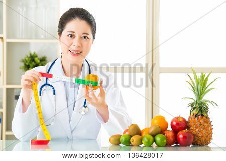 Young Asian Nutritionist Recommend Eating Fruits