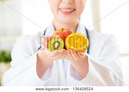 Young Asian Nutritionist Holding  Diet And Healthy Food