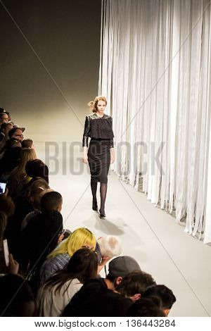 Johannesburg, South Africa - October 23, 2015: Model walking by runway. South African Fashion Week. Collection by ERRE. Catwalk. Hotel Crowne Plaza.