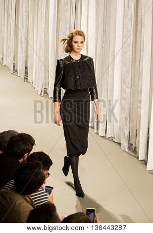 Johannesburg, South Africa - October 23, 2015: Model walking by runway. South African Fashion Week. Collection by ERRE. Catwalk. Hotel Crowne Plaza.