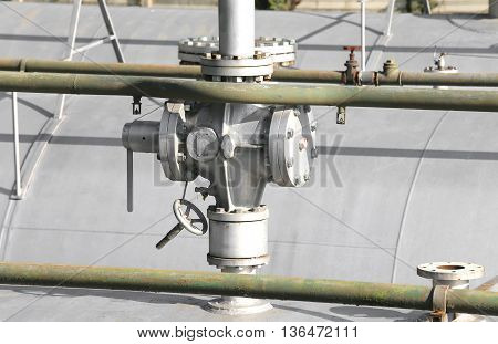 Big Ball Valve Above The Huge Gas Pressure Vessel In The System