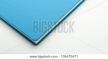 Focus at conner book blue color isolate