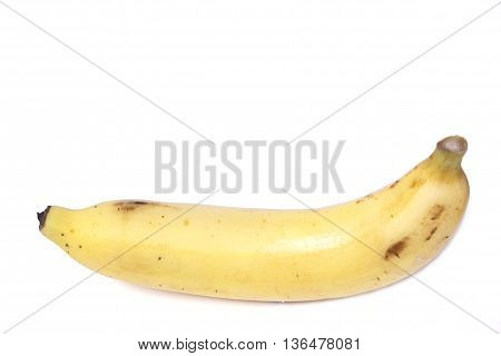 Single banana against on isolated white background