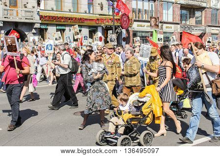St. Petersburg, Russia - 9 May, Men, women and children in the column immortal regiment, 9 May, 2016.
Holiday-action 
