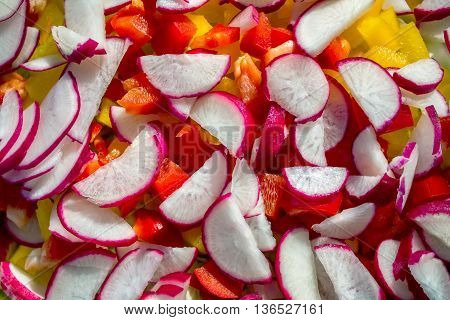 sliced radish small plates with slices of sweet pepper Bulgarian