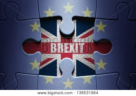 Missing piece from a jigsaw puzzle revealing the British flag and brexit