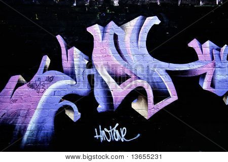 Značka chytré graffiti na zdi
