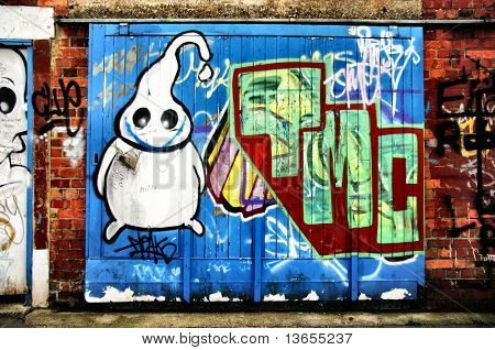 Značka ghost graffiti na cihlovou zeď