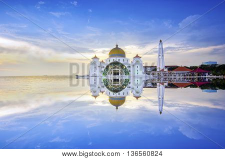 Majestic view of Malacca Straits Mosque during sunset.