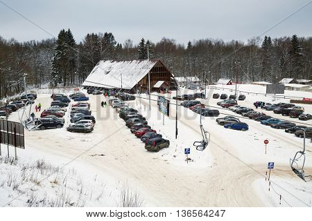 MOSCOW REGION, RUSSIA - DEC 28, 2014: Car parking and chalet at Sports complex Stepanovo. Sports complex Stepanovo is located 50 km from Moscow.
