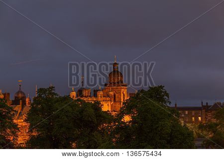 Illuminated George Heriot's School In Edinburgh, Scotland On Cloudy Night