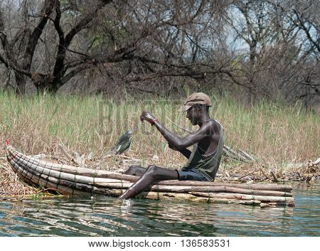 Fisherman Catches A Fish