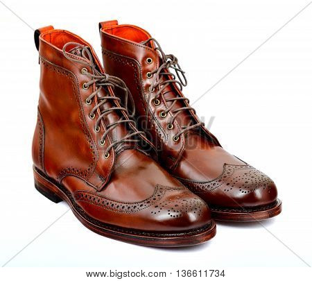 Wingtip dark chili brown dress boots full size isolated on white background