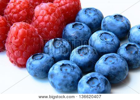 Closeup Of A Bunch Of Raspberries And Blueberries