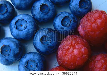 Closeup Of A Bunch Of Raspberries And Blueberries