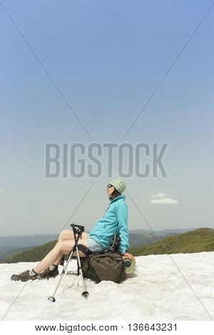 Hiking in the mountains in the summer on a sunny day.