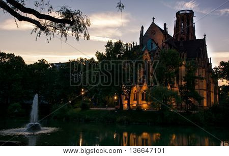 Sunset at the Johanneskirche on Feuersee Lake in Stuttgart, Germany