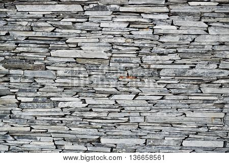Stone wall background for design and decoration
