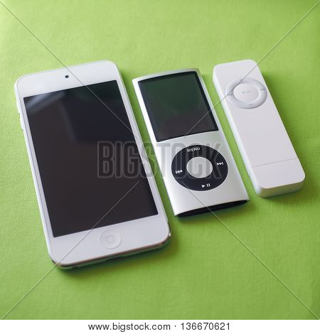 BERRY AUSTRALIA - June 23 2016 : Three Apple iPods (left to right) - iPod Touch 5th generation iPod Nano 4th generation and iPod Shuffle 1st generation.