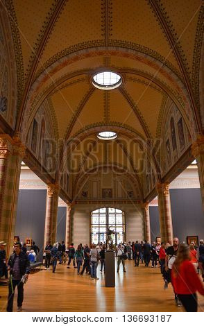 Amsterdam - September 16, 2015: Tourist At The Upper Floor Of The Rijksmuseum In Amsterdam, Netherla