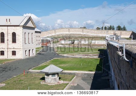 FREMANTLE,WA,AUSTRALIA-JUNE 13,2016: Elevated view over the limestone architecture and grassy yard at the Fremantle Prison in Fremantle, Western Australia.