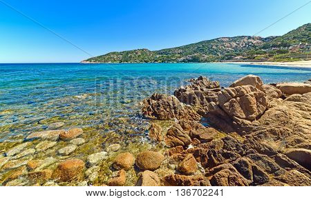 rocks and turquoise water in Cala Battistoni Sardinia