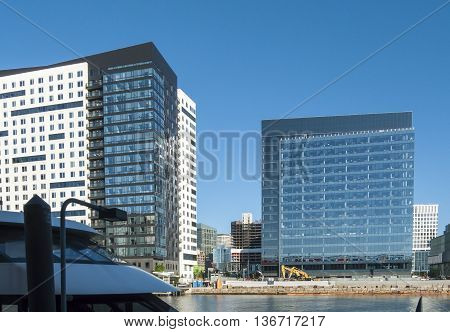 Boston Massachusetts USA - June 30 2016: Multiple construction projects filling in among existing buildings in South Boston's Seaport District