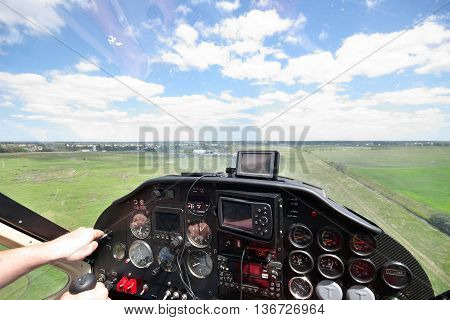View from the cocpit of a small plane on final landing