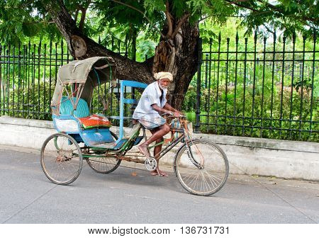 Old Indian  Rickshaw Man  In Pondicherry, India