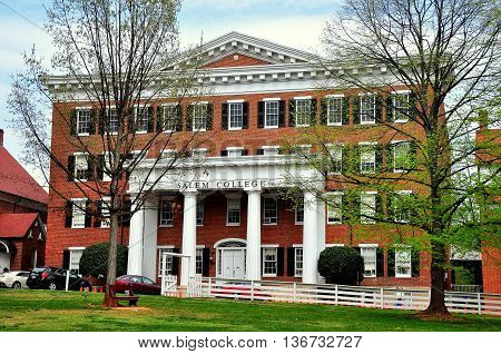 Old Salem North Carolina - April 21 2016: Salem College faces the Salem Square Village Green *