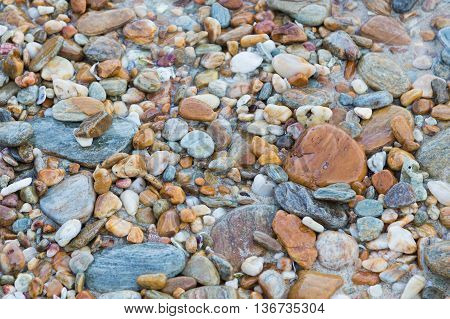 Round sea stone, natural background and teture