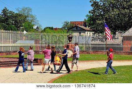 New Bern North Carolina - April 24 2016: Volunteer Fife and Drum Corps marching across the inner courtyard at 1770 Tryon Palace  *