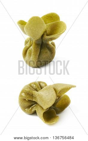 Single sacchettoni stuffed sacchetti pasta isolated over the white background, set of two different foreshortenings